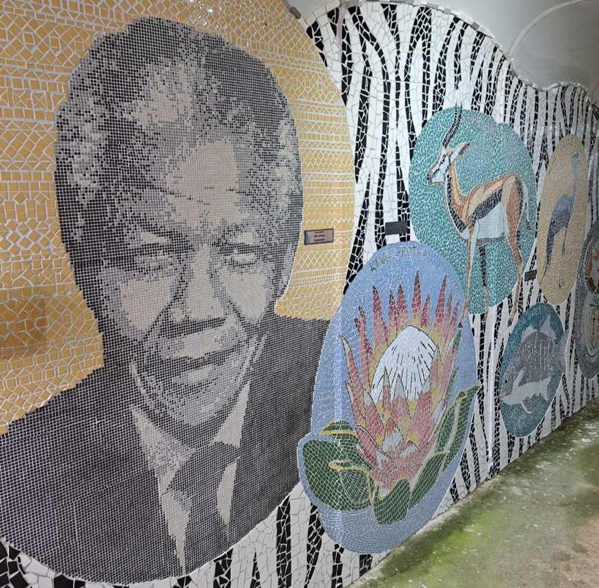 mosaic-tunnel point of human origin cave